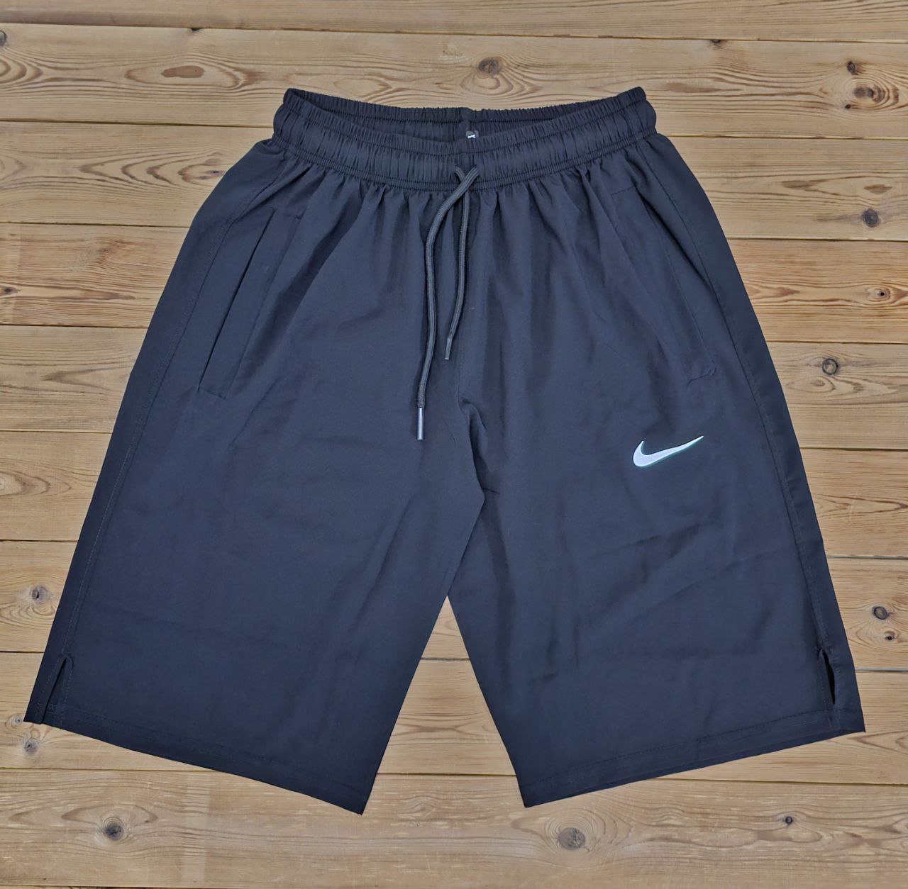 شلوارک ورزشی مردانه بلند 56 سانت مدل NIKE پارچه آیرو کره ای جیب دار سبک و خنک با ضمانت تک رنگ مشکی