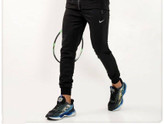 شلوار ورزشی مردانه مدل NIKE پارچه غواصی دمپا کش جیب دار تک رنگ مشکی